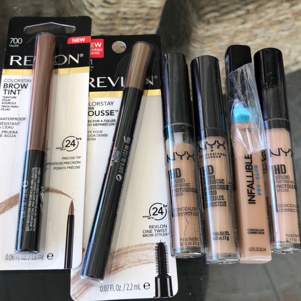 3 nyx concealer , one loreal concealer,